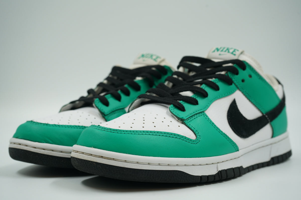 Pair of pre-owned Nike Dunk Low in Stadium Green, white and black with vintage-style Nike tongue labels