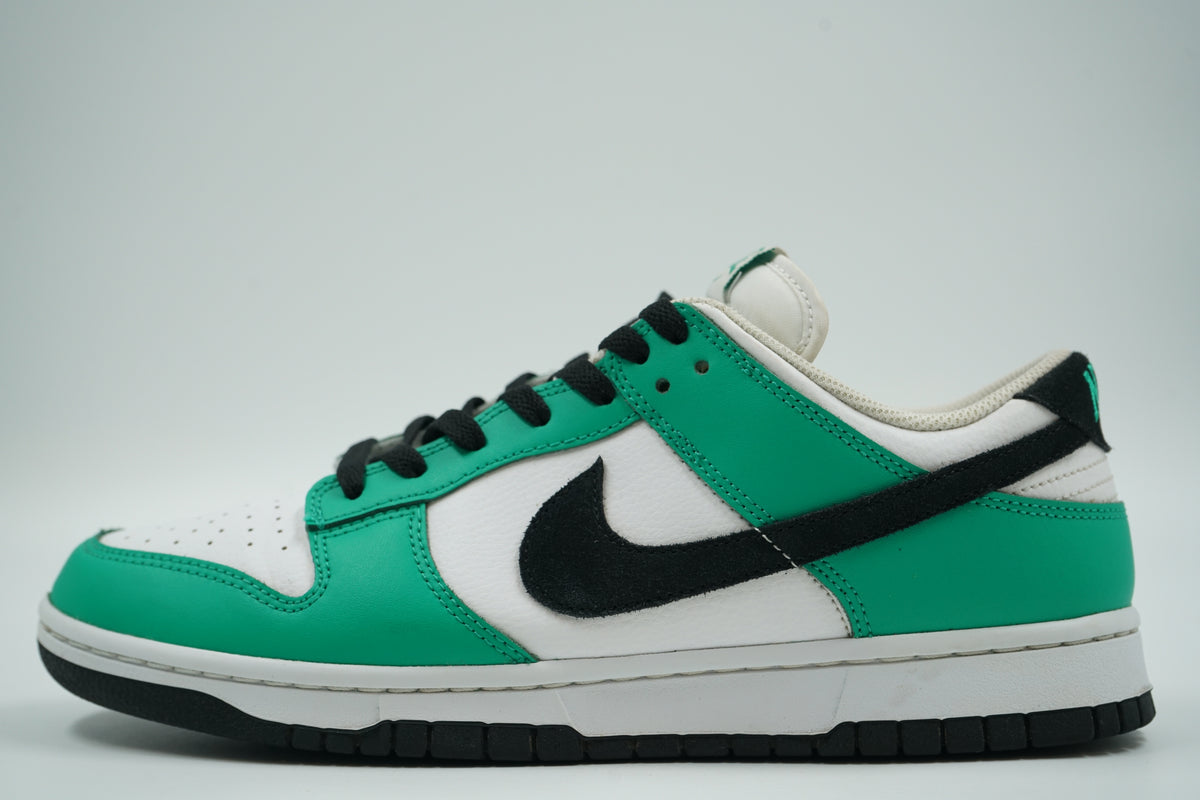 Pre-owned Nike Dunk Low in Stadium Green, white and black with black suede Swoosh, side view