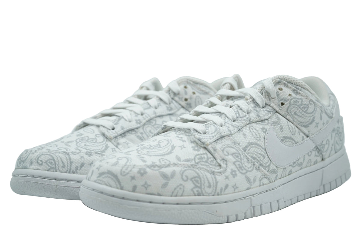 Pair of women's Nike Dunk Low White Paisley in white canvas with grey paisley print, front view