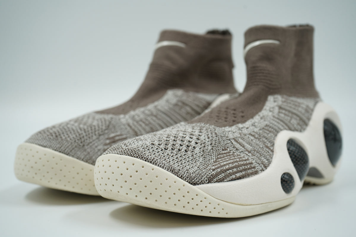 Pre-owned pair of Nike Flight Bonafide Dark Mushroom with Flyknit sock upper and perforated sail toe, front view