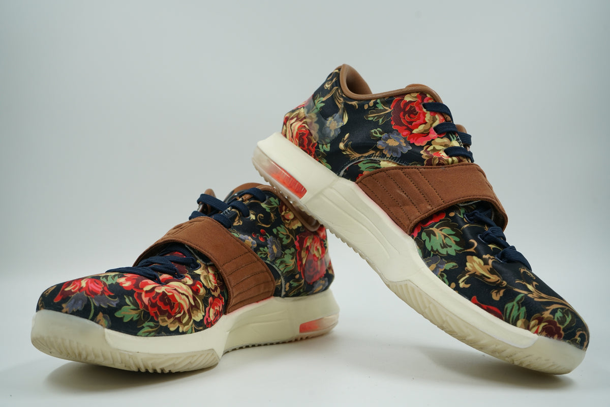 re-owned pair of Nike KD 7 EXT Floral with navy floral print, brown suede strap and sail midsole, side view