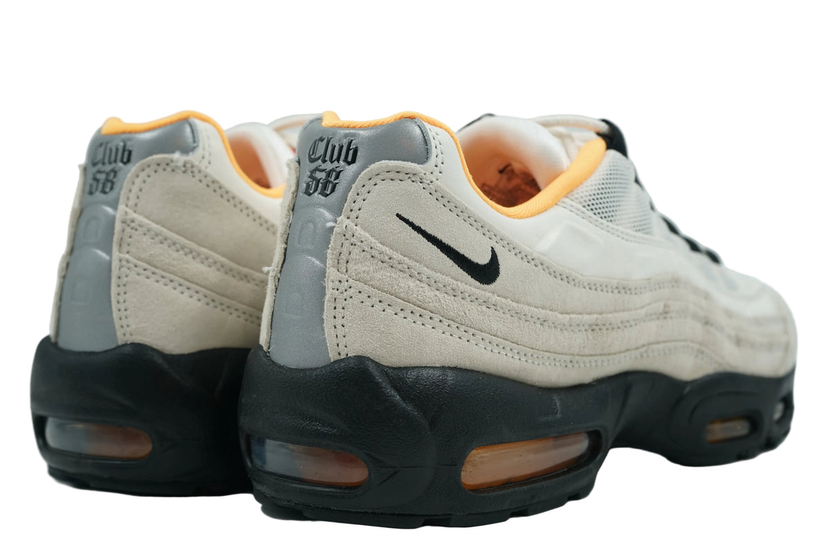 Nike SB Air Max 95 Club 58 with Club 58 embroidery on silver heel tab and orange Air unit, back view