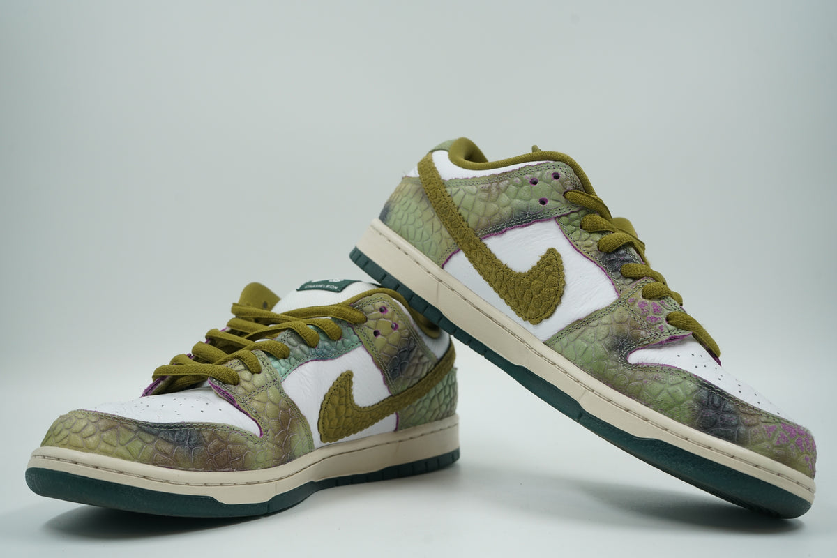 Pre-owned pair of Alexis Sablone x Nike SB Dunk Low Chameleon with green reptile texture and teal outsole, side view