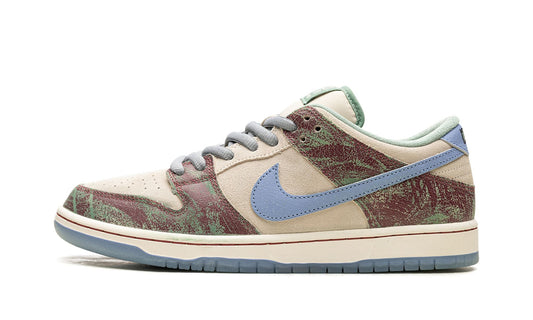 Nike SB Dunk Low x Crenshaw Skate Club (CSC) featuring wear-away overlays and a translucent icy outsole. Limited edition collaboration available at our Malmö store and online.