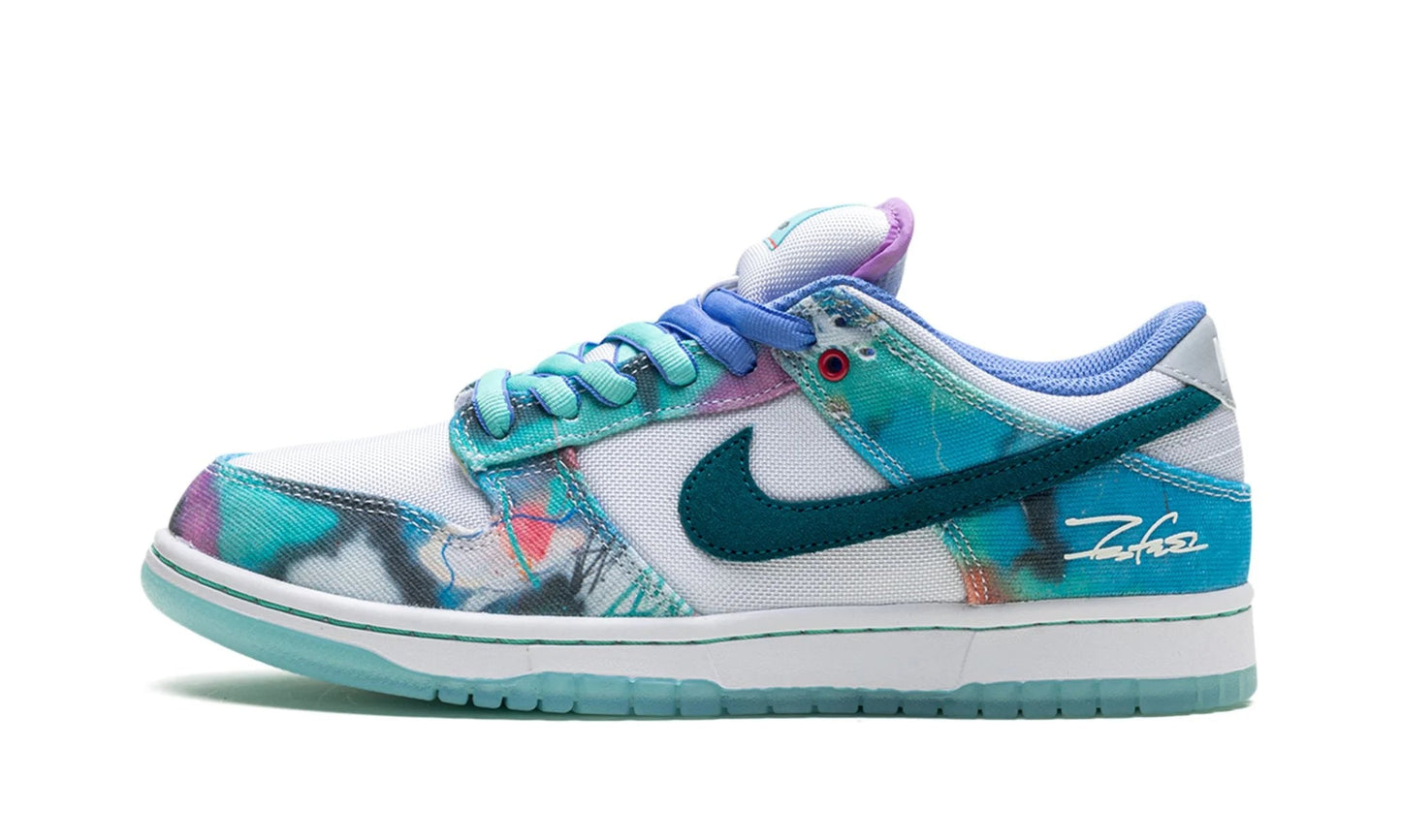 Nike SB Dunk Low x Futura Laboratories 'Bleached Aqua' (HF6061-400) featuring a graffiti art canvas upper and icy blue sole. Limited edition authentic pair available at our Malmö store and online.