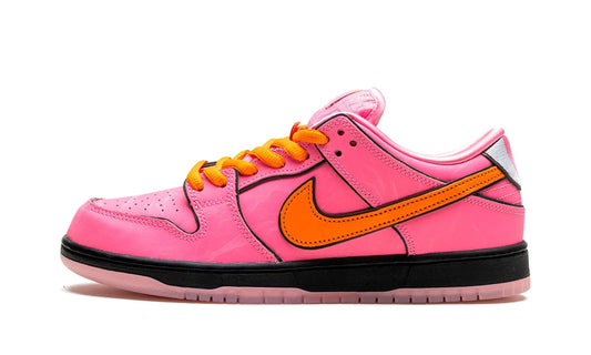 Nike SB Dunk Low x The Powerpuff Girls 'Blossom' featuring a lotus pink nubuck upper, orange Swoosh, and embroidered eyes on the heel. Limited collaboration available at our Malmö store.