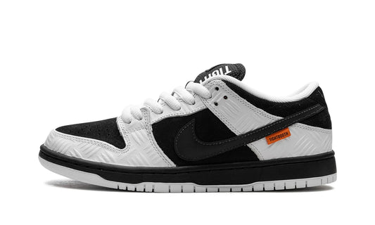 Nike SB Dunk Low x TIGHTBOOTH featuring white metal-grate textured overlays and a reflective tongue. Limited edition skate shoe available at our Malmö store.
