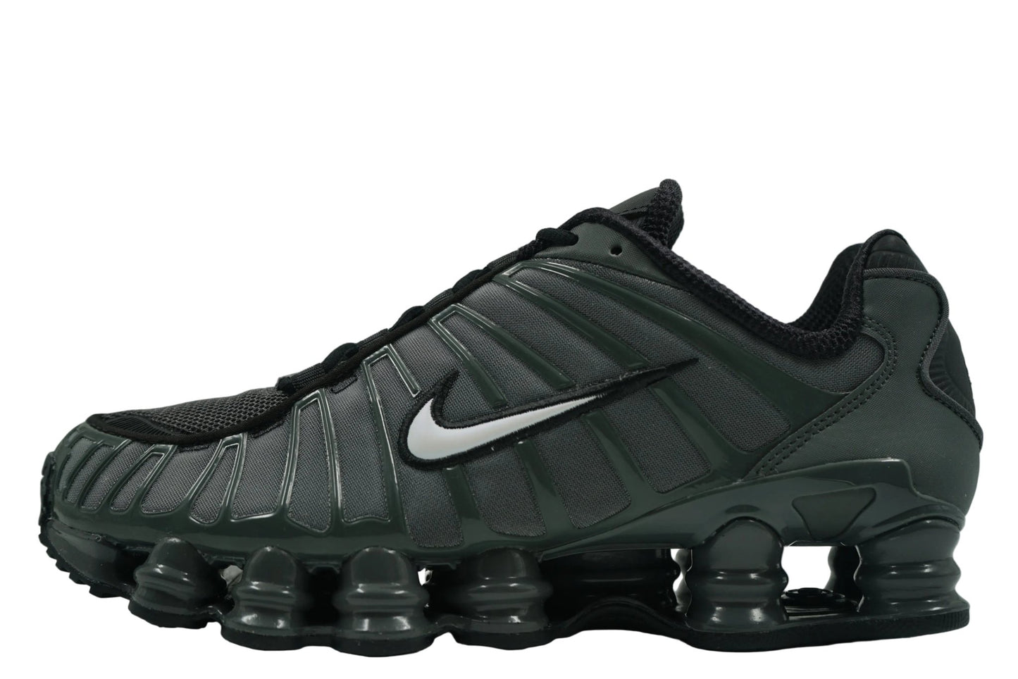 Nike Shox TL 'Iron Grey' featuring a breathable mesh upper with a glossy TPU cage and full-length mechanical cushioning. Y2K style sneaker available at our Malmö store.