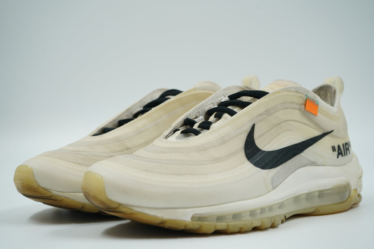 Pair of pre-owned Off-White x Nike Air Max 97 The Ten in white with black laces and yellowed soles, front view