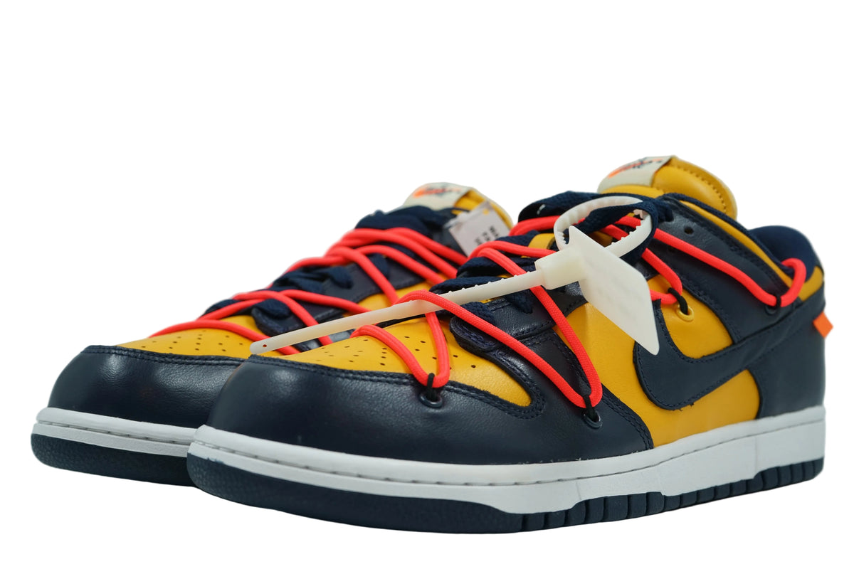 Brand new Off-White x Nike Dunk Low University Gold and Midnight Navy, front view with orange laces