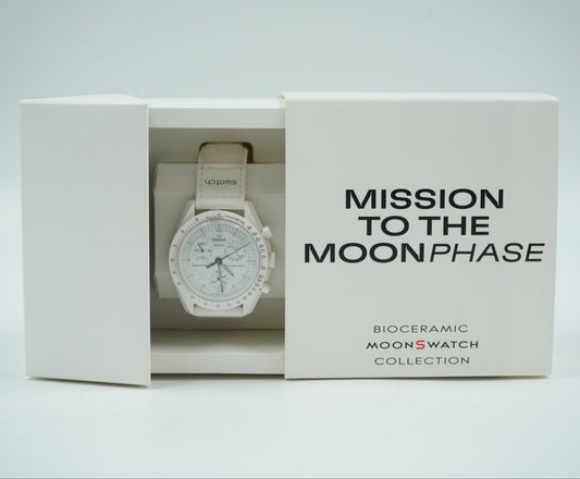 Brand new Omega x Swatch MoonSwatch Mission to the Moonphase Snoopy in white Bioceramic, in original box