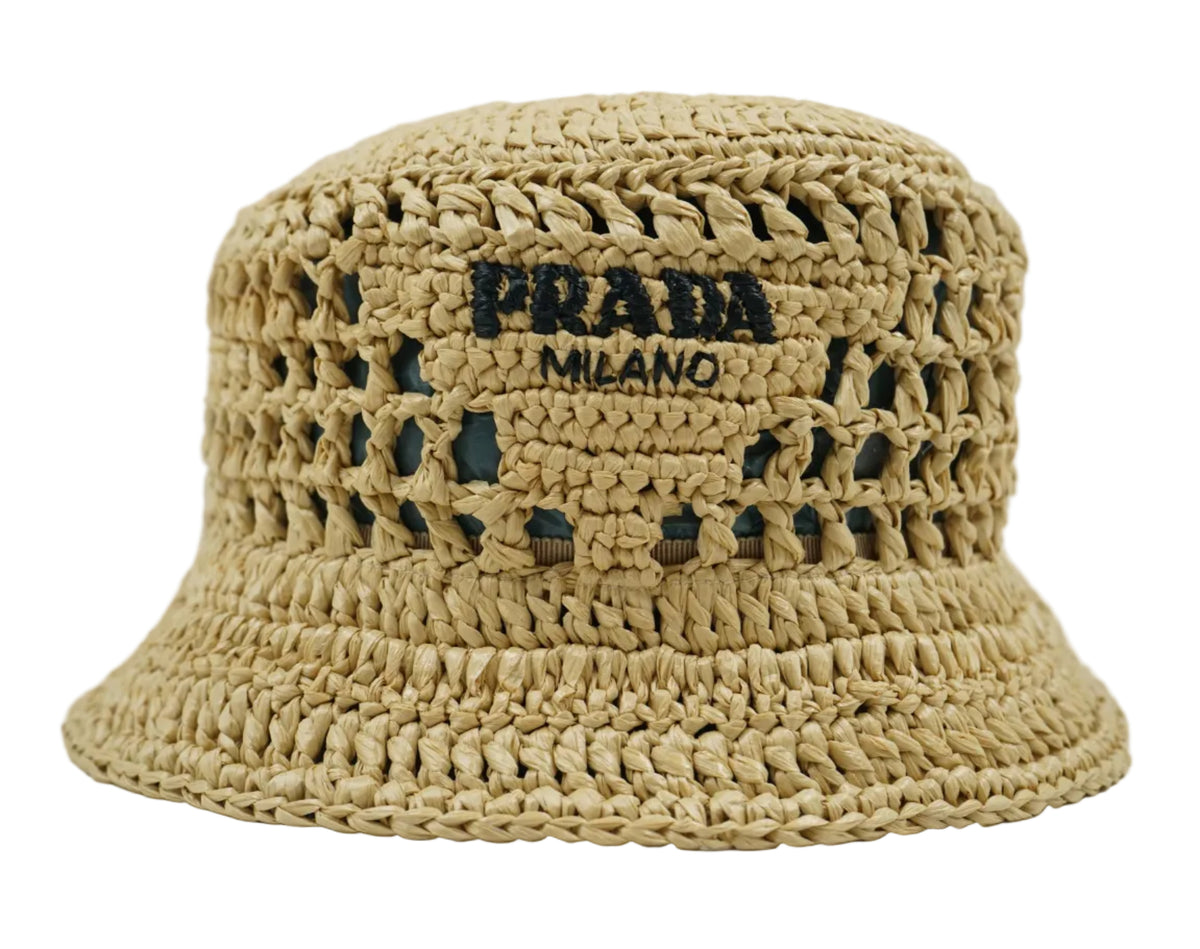 Prada crochet raffia bucket hat in natural straw with black embroidered Prada Milano logo, front view