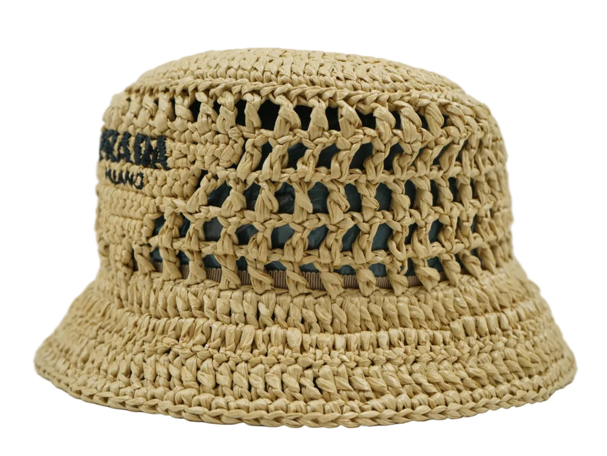 Prada crochet raffia bucket hat in natural straw with open-weave crown and dark lining, side view