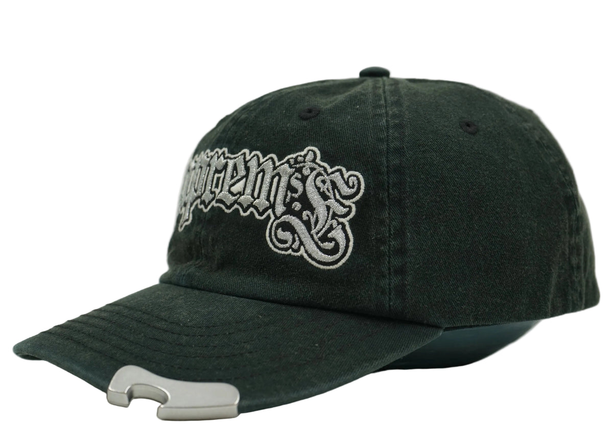 Supreme Bottle Opener 6-Panel cap in washed black with gothic logo and metal opener on peak, side view