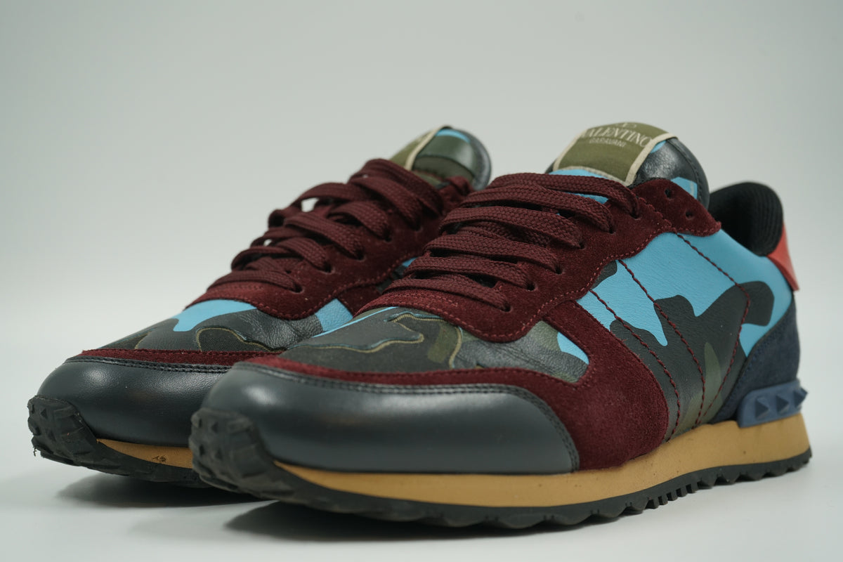Pair of pre-owned Valentino Garavani Rockrunner in blue camo and burgundy suede, front angle view