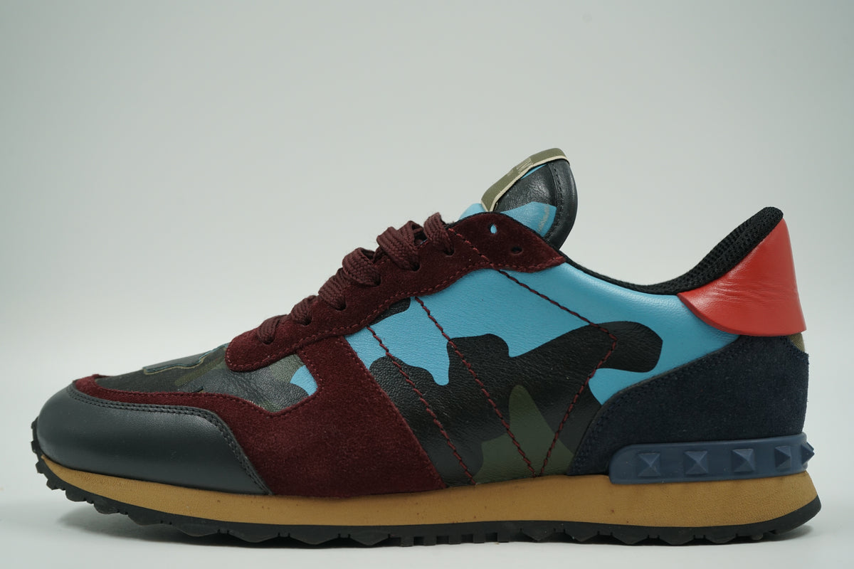 Pre-owned Valentino Garavani Rockrunner in sky blue camo and burgundy suede with navy Rockstud heel, side view