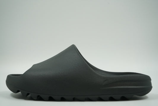 Pre-owned adidas Yeezy Slides Onyx HQ6448 in black EVA foam, side view