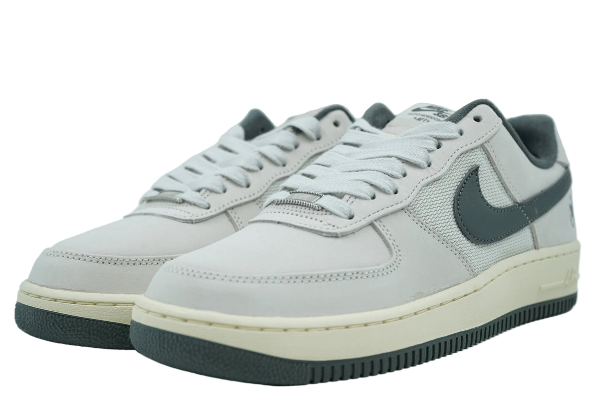 Pair of Yuto Horigome x Nike SB Air Force 1 Low in light bone nubuck with iron grey Swoosh and spring lace dubrae, front view
