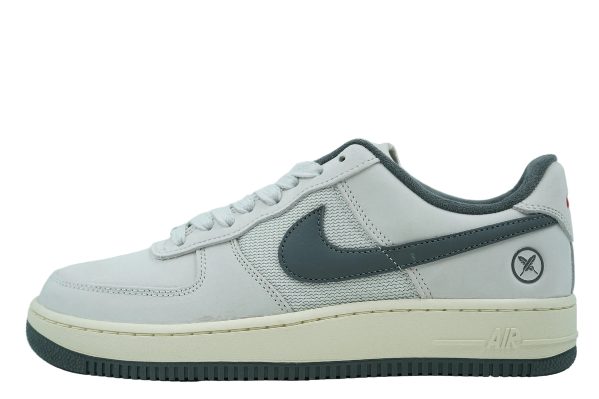 Yuto Horigome x Nike SB Air Force 1 Low in light bone nubuck and mesh with iron grey Swoosh and feather logo, side view